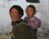 Pilgrim and baby Tashilumpu Monastery