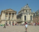 The exterior of the royal chapel and a view of the motto placed on the palace by Napoleon.