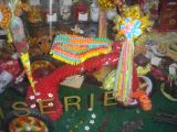 Candy tricycle in window of candy shop