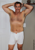 a boxer shorts wearing daddie flexing.jpg