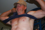 trucker removing tanktop hairychest.jpg