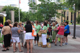 Morning line ladies swapping while waiting to enter convention.