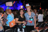 More ladies wearing their swap cards displayed on their head.