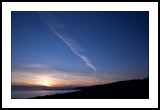 Contrail at sunset
