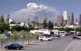 LOS ANGELES SKYLINE WITH FIRE IN THE HILLS