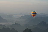 Hot air balloon above the Karst mountains