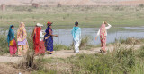 Indian attire:  Salwar-kameez (2 on left) & saris
