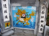 This Ngoc Son Temple mural looks like a cross between a unicorn and a dragon.