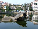 Wreckage in Huu Tiep Lake where a U.S. B-52 bomber was shot down during the 1972 Christmas bombing of Hanoi.