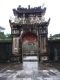 From the Stele Pavilion and pillars, you pass through this ornate ceremonial gate.