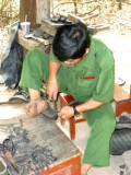This craftsman was making sandals out of used tires.  Ho Chi Minh used to wear them.