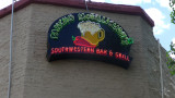 Neon sign for Pancho McGillicuddy's Southwestern Bar & Grill, which is next door to the Red Garter Inn.