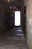 Interior of slave quarters where Africans were crowded into cells waiting to be transported.