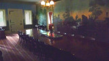 The Main Hall, with French wallpaper and a banquet table, served as a family dining room and for conducting political business.