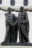 Since Simon Bolivar (on the left) was so short, the sculptor made him much taller so he would equal St. Martins stature!