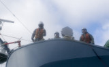 Crew members aboard the.jpg
