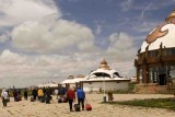 Travelers approaching Yurts