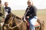 Mounted Blonde expatriate