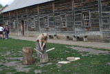 1800s woman chopping wood
