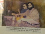 Francis Ford Coppola:  The director and script writer of The Godfather  editing his scripts for this film in Cafe Trieste.