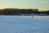 mushers on lake.jpg