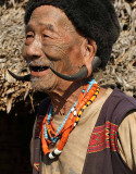 Konyak Naga with tattoos of a successful headhunter near Shangnyu.