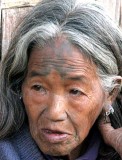 Naga lady with tattoos that shall ward off tigers