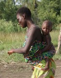 Mother and child dancing in Benin.