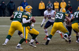 Aaron Rodgers drops back to pass.