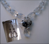 crystal and sterling silver necklace with gemstone pendant; faceted crystal and sterling silver earrings