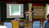 Horukuru giving a talk.