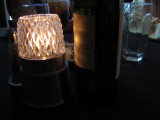 The candle & wine bottle on the table.jpg