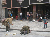 Praying outside Jokhang Temple