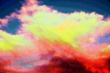 I see the morning sky light up like flames.