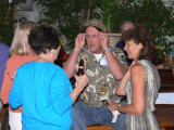 Ronnie Waynick entertaining Cindy Graham, Donna Posey and Joy Bierly