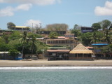 hotel in the middle of picture with columns