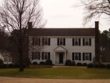 And this house looks something like OURS (well, with one pair of extra windows on each side)