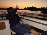 ...waving to other boaters...