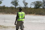 Our guide became the ground crew. He had to chase an elephant from the runway!