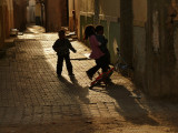 Minding little brother, Tozeur, Tunisia, 2008