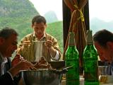 Vendor at work, Li River, Guilin, China, 2006