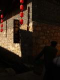 Shadows at the corner, Shuhe, China, 2006