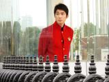 Ticket seller, Pearl Tower, Shanghai, China, 2006