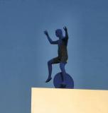 Sculpture In Blue On A White Roof.JPG