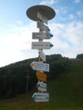 Outside the hotel many direction to go to...