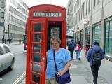 Ann at one of Londons Red phone booths
