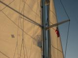 I like the lines and shadows made by the sail and rigging.......