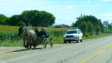 An Amish buggy and its wooden wheels is a common site in Huron County