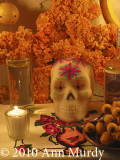 Sugar skull and votive