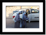 Nuns Getting Off a Taxi at Church of Gethsemani
